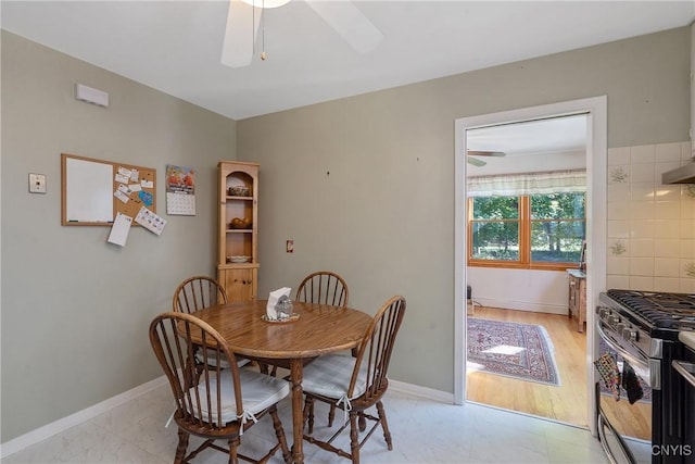 dining area featuring ceiling fan