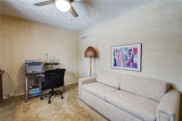 office space with ceiling fan and carpet floors