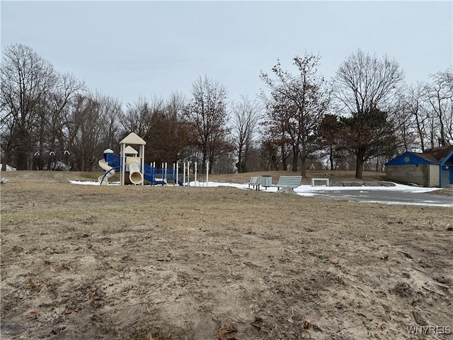 view of yard featuring playground community