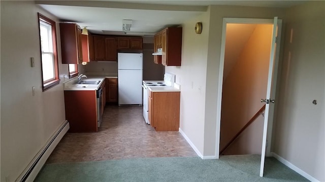 kitchen with white appliances, light carpet, sink, and a baseboard heating unit