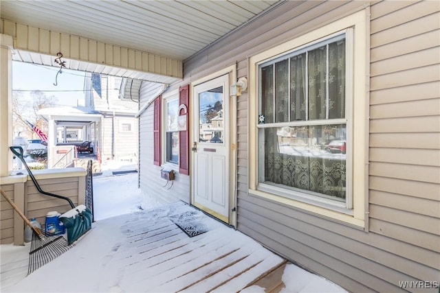 doorway to property with a porch