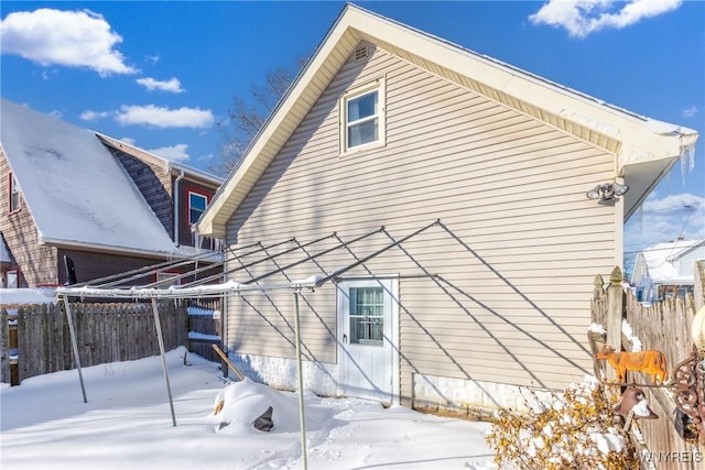 view of snow covered property