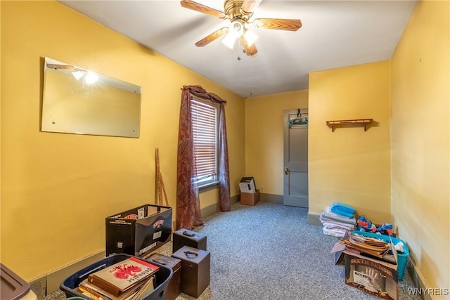 playroom with carpet flooring and ceiling fan