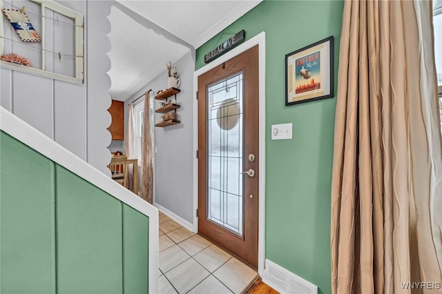 foyer featuring light tile patterned floors