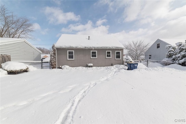 view of snow covered house