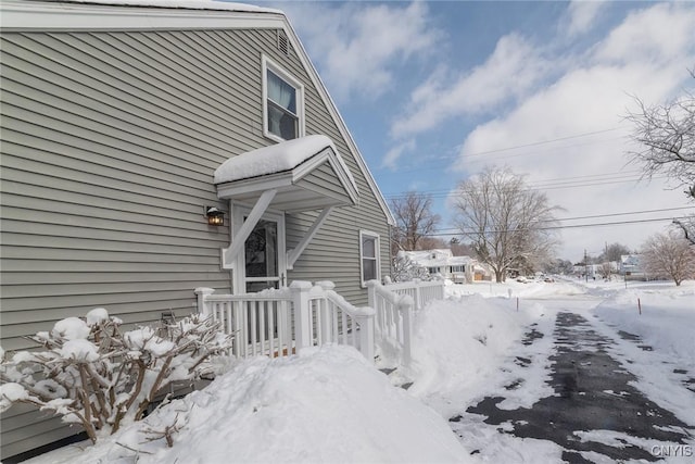 view of snow covered property