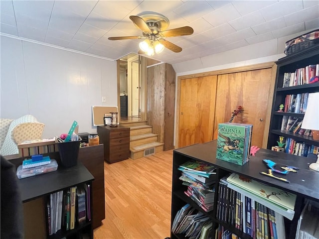 office space with ceiling fan and wood-type flooring