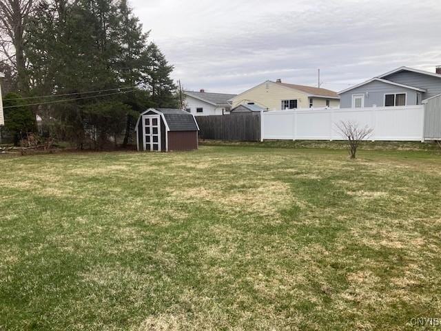 1612 Copperfield St, Utica, NY 13501 - view of yard featuring a storage shed, an outbuilding, and fence