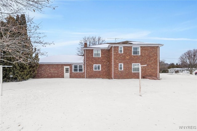 view of snow covered house