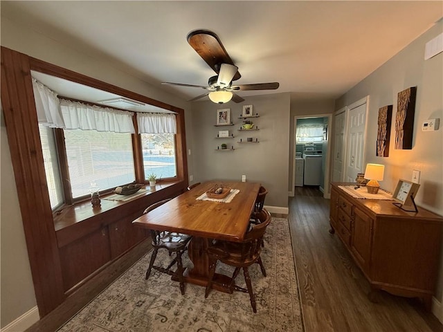 dining space featuring ceiling fan and dark wood-type flooring