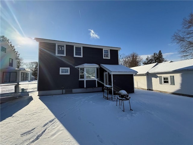 view of snow covered property