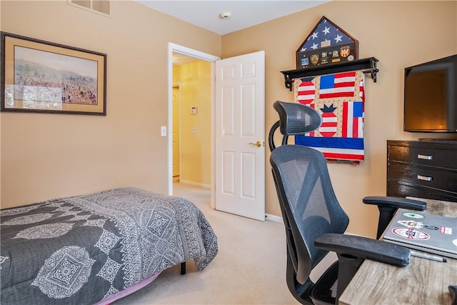 bedroom with light carpet