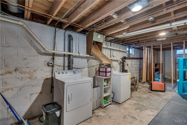 basement featuring washer and dryer