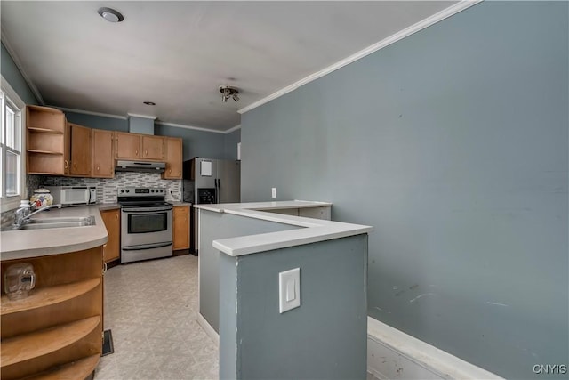 kitchen with sink, crown molding, stainless steel appliances, and decorative backsplash