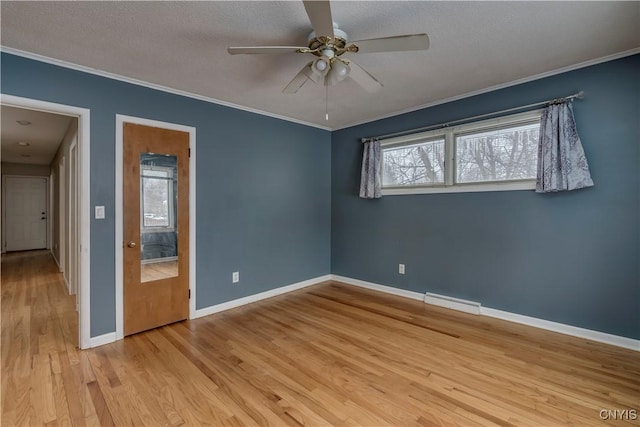 unfurnished bedroom featuring light wood-type flooring, a textured ceiling, ceiling fan, and ornamental molding