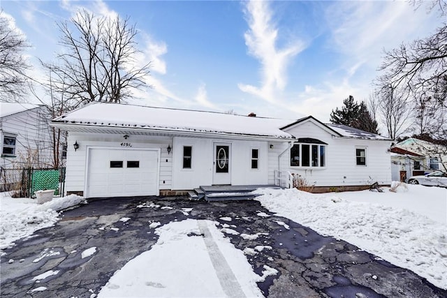 view of front of property featuring a garage