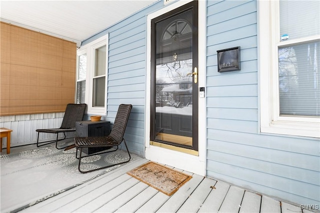 property entrance with covered porch