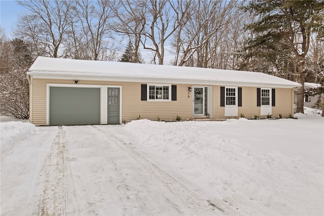 ranch-style home with a garage