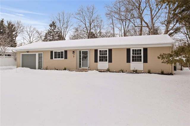 single story home featuring a garage