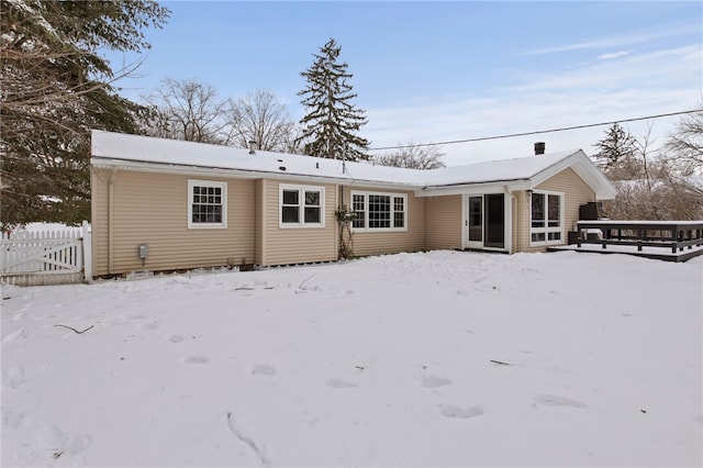 view of snow covered house