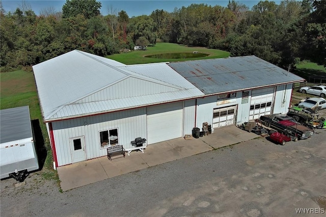 garage with a lawn