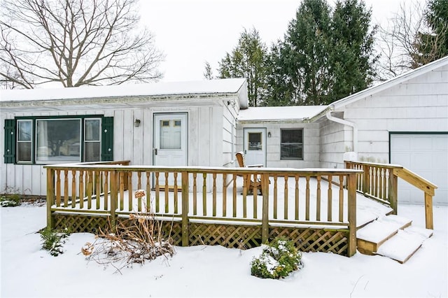 exterior space featuring board and batten siding and an attached garage