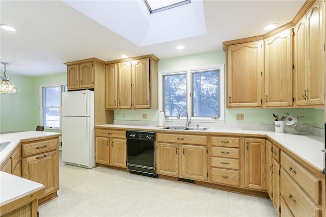 kitchen featuring freestanding refrigerator, black dishwasher, light countertops, light floors, and a sink