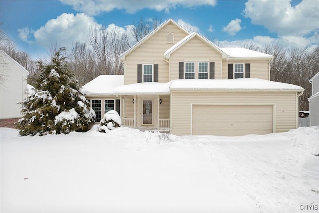 traditional-style home featuring a garage