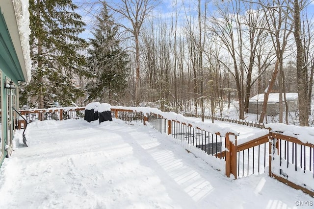 view of yard covered in snow