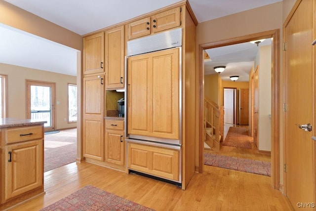 hall with light wood-type flooring