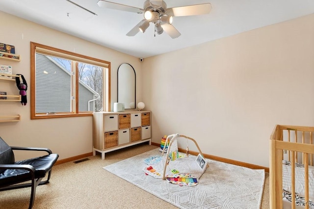 bedroom featuring ceiling fan and carpet flooring