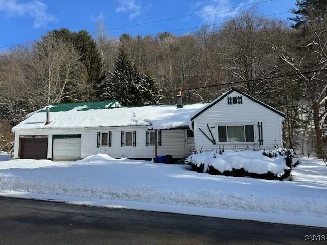 4140 Mcgraw N Rd, Cortlandville, NY 13101 - view of front of property with a garage