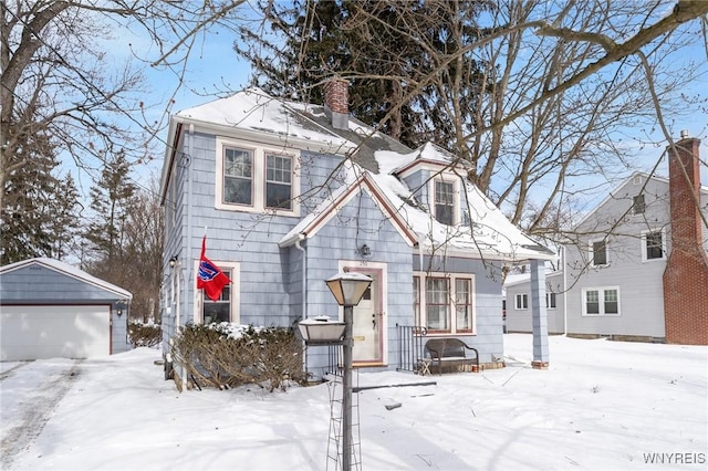 view of front property featuring an outbuilding and a garage