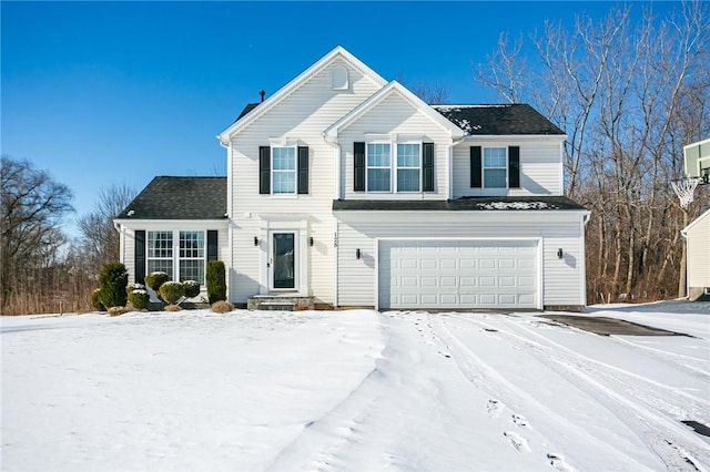 front of property featuring a garage