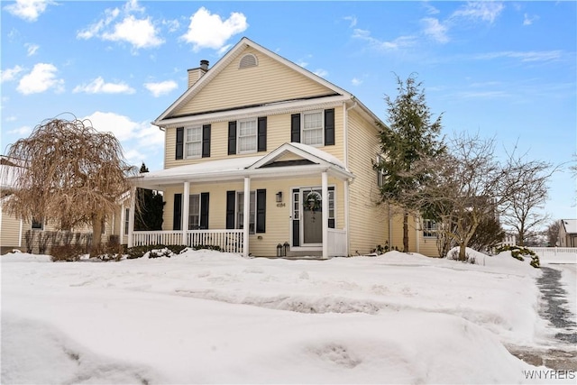 front facade featuring covered porch