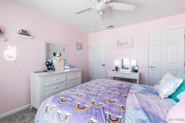 carpeted bedroom with ceiling fan