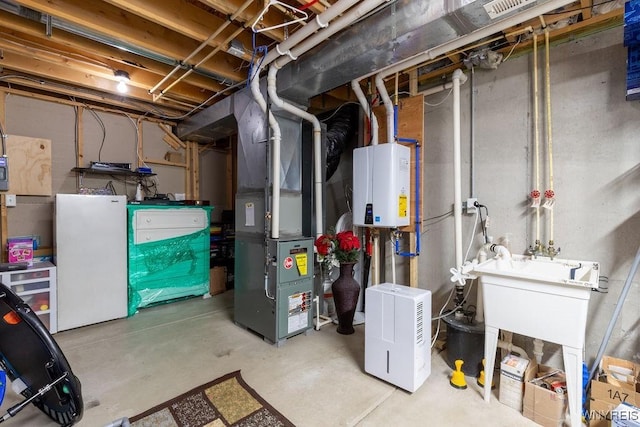 utility room featuring tankless water heater and heating unit