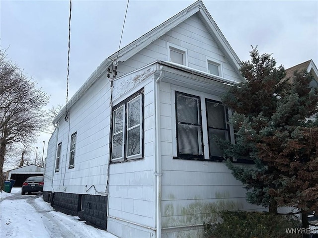 view of snow covered property