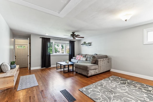 living room featuring dark hardwood / wood-style flooring