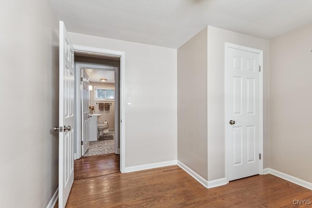 hall featuring dark hardwood / wood-style floors