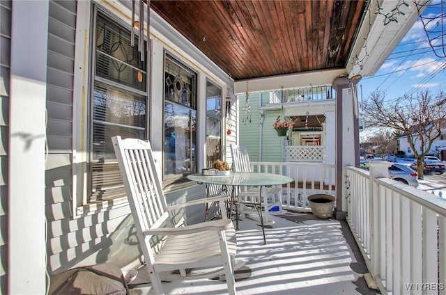 balcony featuring covered porch