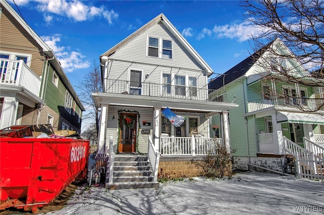 view of front of property featuring covered porch