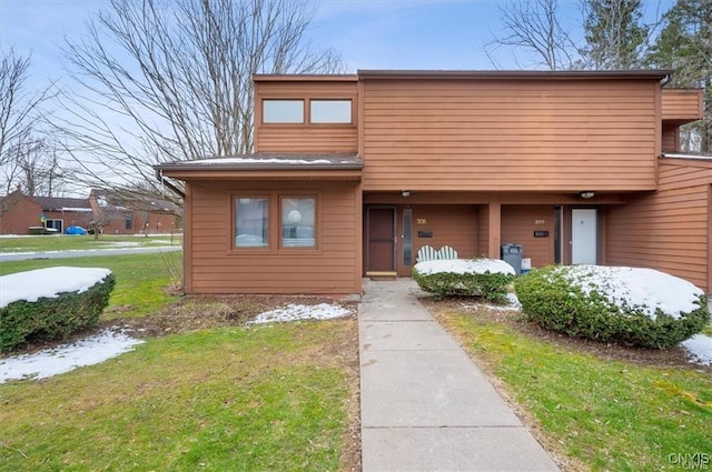 view of front of house with a front yard