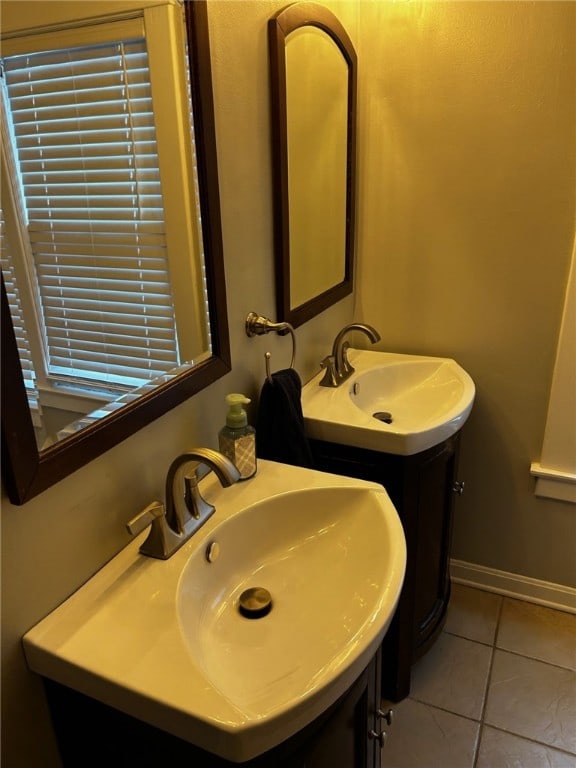 146 N Broad St, Norwich-City, NY 13815 - bathroom with tile patterned floors and vanity