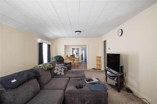 living room with carpet floors and ornamental molding