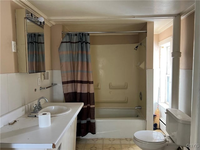 full bathroom with toilet, vanity, ornamental molding, and shower / bath combination with curtain