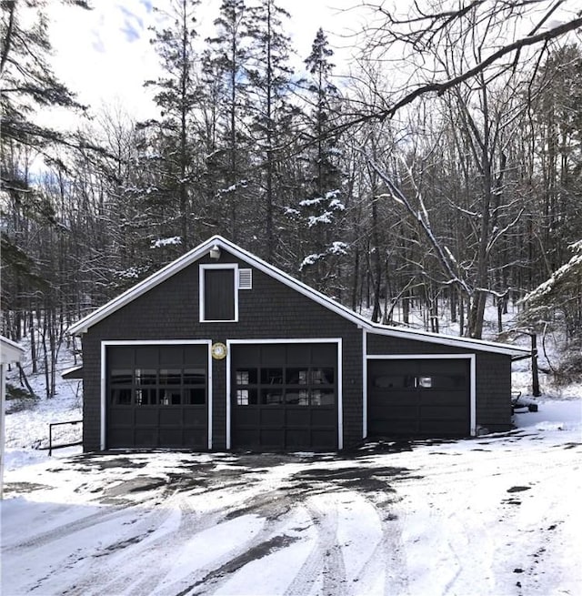 view of snow covered garage