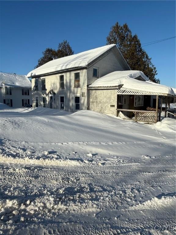 view of snow covered property