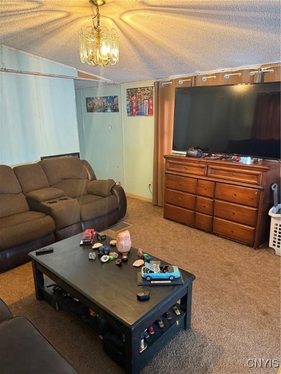 11082 State Route 26, Denmark, NY 13619 - carpeted living room with a textured ceiling and a notable chandelier