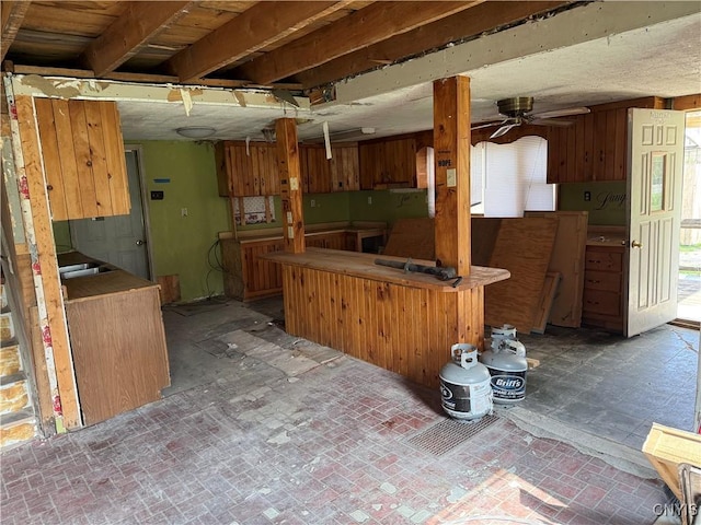 kitchen featuring ceiling fan